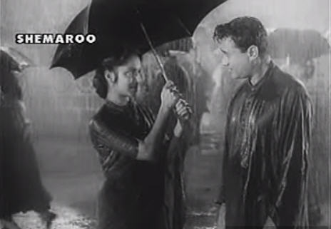 Sharing an umbrella in the rain