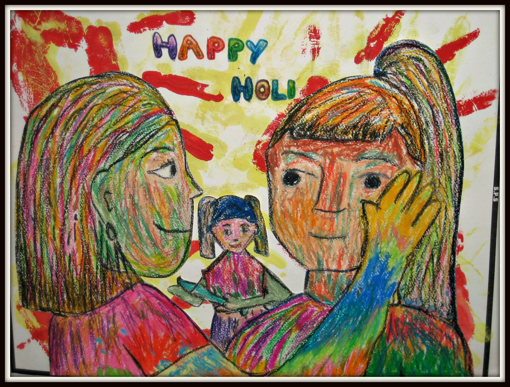 Girls applying Holi colours