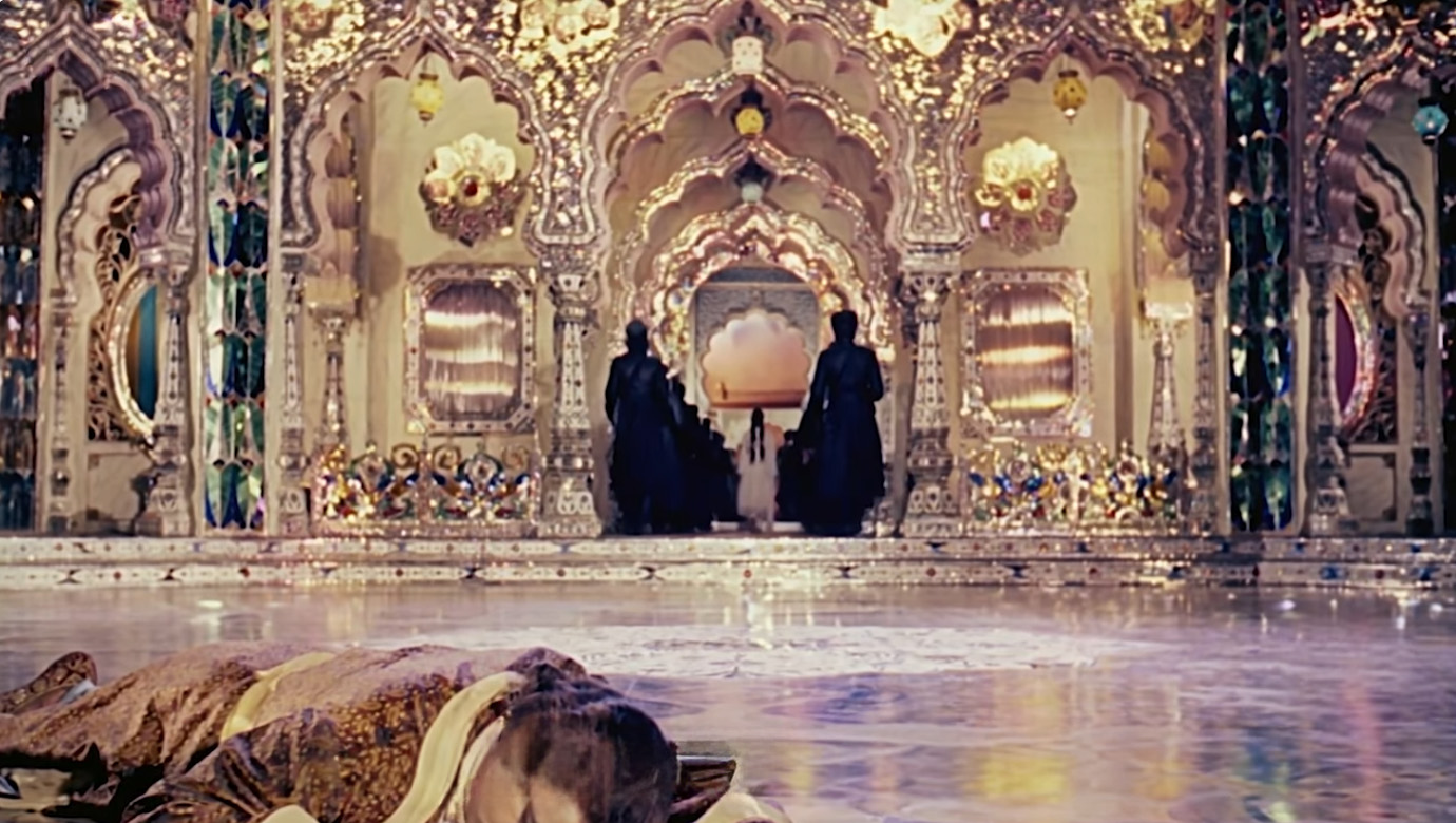 Anarkali is taken away, leaving behind the unconscious Salim