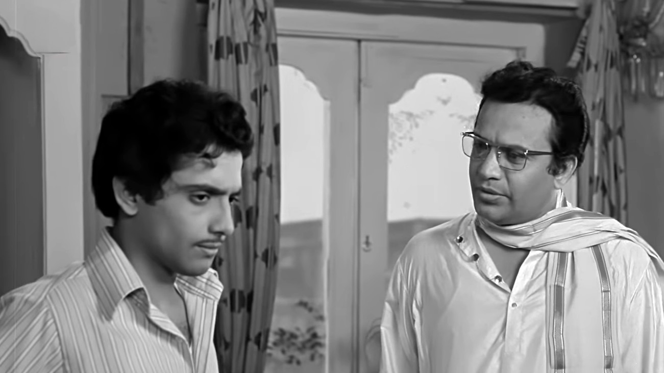 Partha Chatterjee and Uttam Kumar in Bagh Bandi Khela