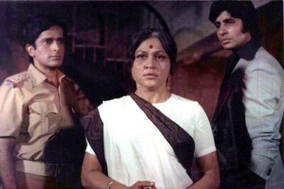 Shashi Kapoor, Nirupa Roy and Amitabh Bachchan in Deewar