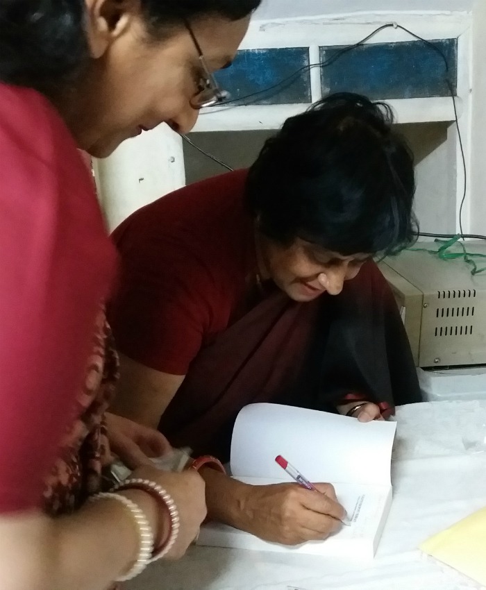 Santosh Bakaya signing her books at the launch