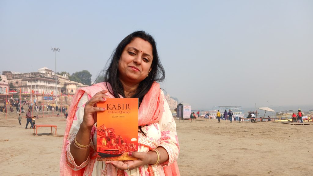 Smita Tiwari with her book at the Assi Ghat,Varanasi.