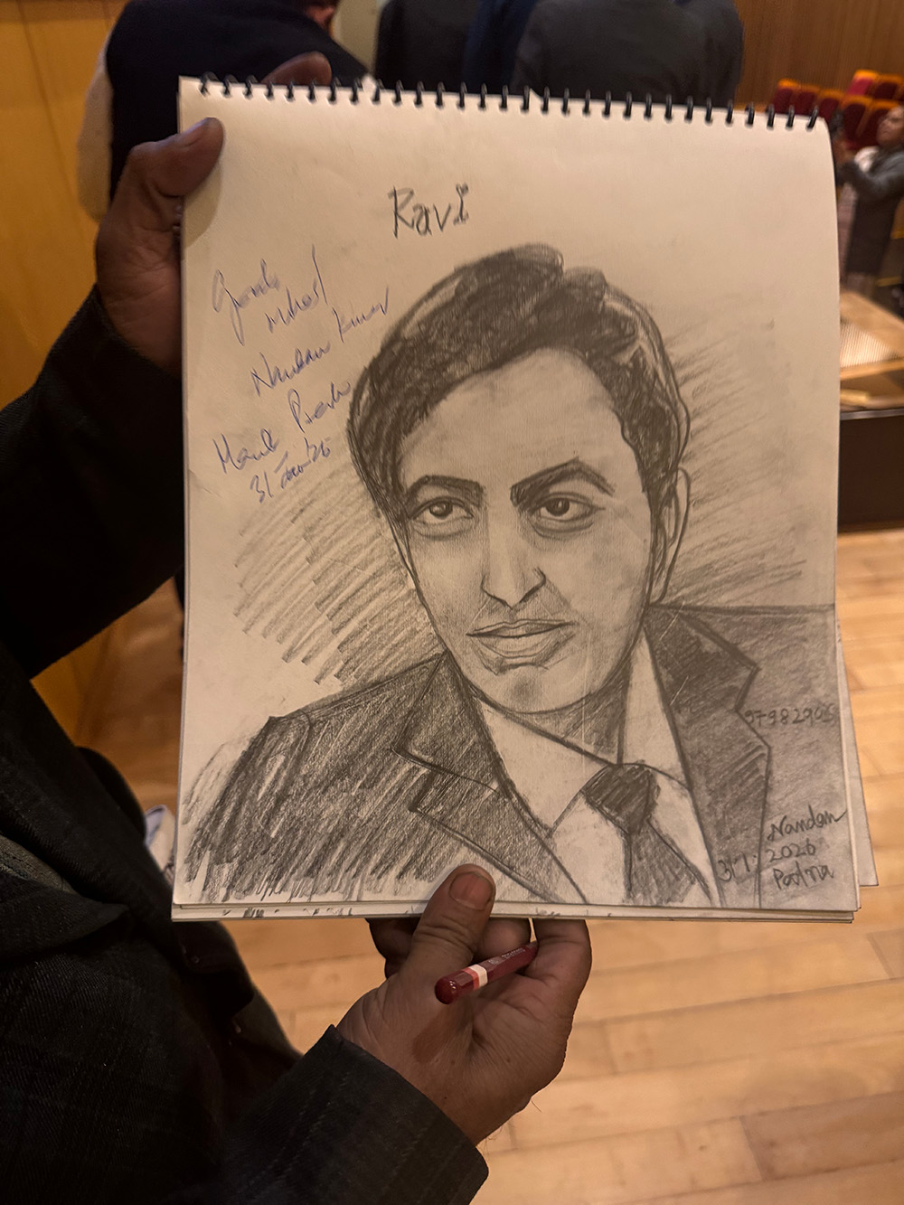 A sketch of Ravi drawn by an artist from the audience